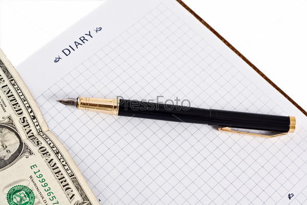 Diary with money and pen isolated on white background