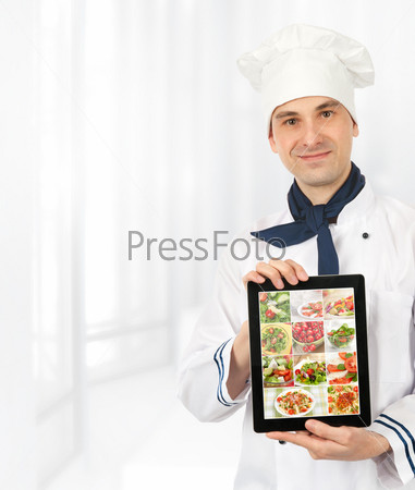 cook man showing a digital tablet with menu