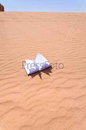 Note book on sand dune of Wadi Rum desert