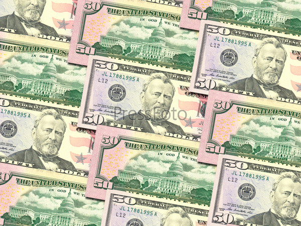 Abstract background of money pile 50 USA dollars bills for your design. Studio photography.