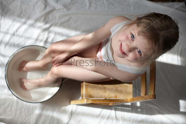 Girl washing feet