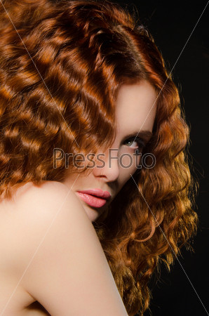 horizontal portrait of woman with red hair