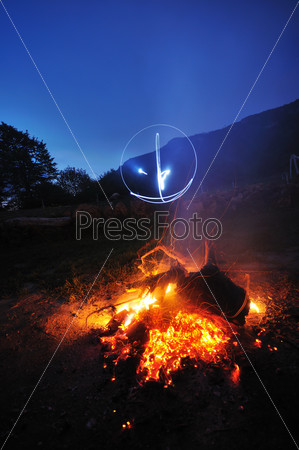 fire with long exposure on camping at night