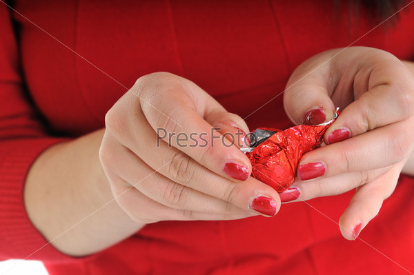 woman in red shirt eat chocolate sweet food