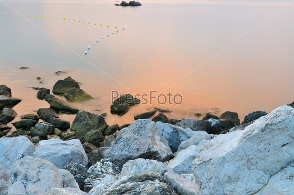 sea rock with long exposure representing a peace and harmony concept