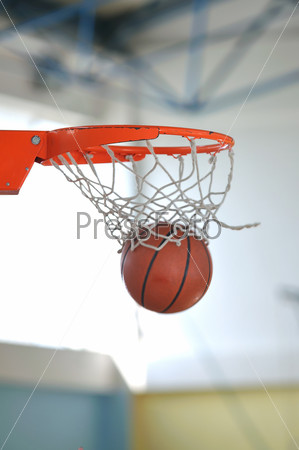 Basketball ball indoor at school and gym , stock photo