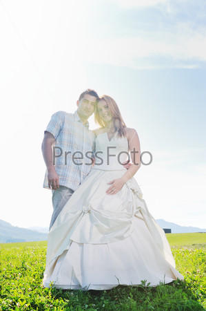 beautiful bride outdoor with colorful windmill toy