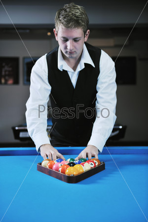 young man play pro billiard game