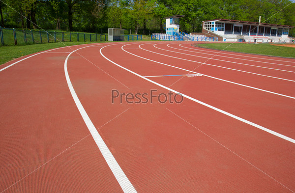 white curved lines of race tracks on stadium