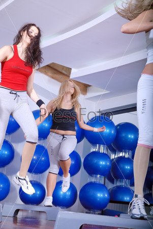 girls stepping in a fitness center