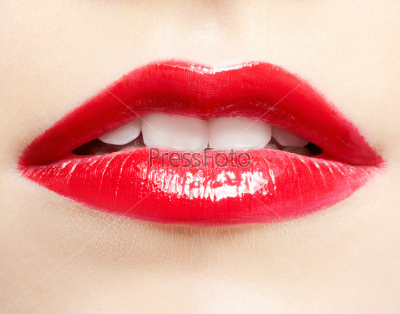 close-up portrait of young beautiful woman\'s lips zone make-up