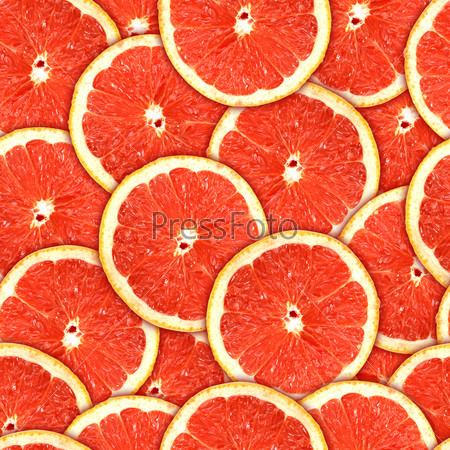 background of heap fresh red grapefruit slices. Seamless pattern for your design. Close-up. Studio photography.