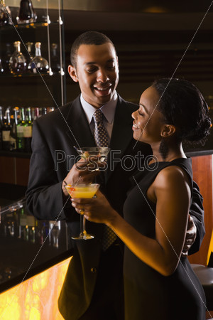Couple at bar.