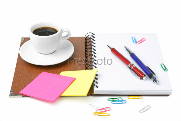 Office supplies and coffee cup isolated on white background