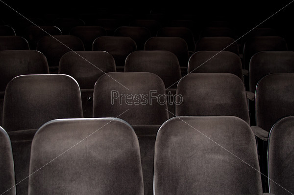 Empty chairs at cinema or theater, stock photo
