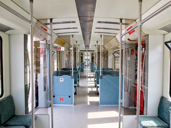 Central diminishing perspective of a train interior, stock photo