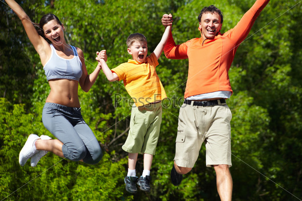 Simultaneous family jump manifesting love for life and vitality