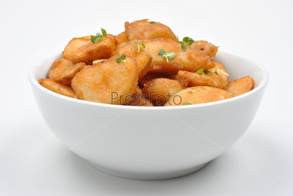 some fried potato wedges in a bowl