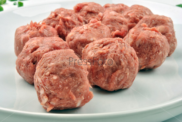 meat balls with organic parsley on a plate