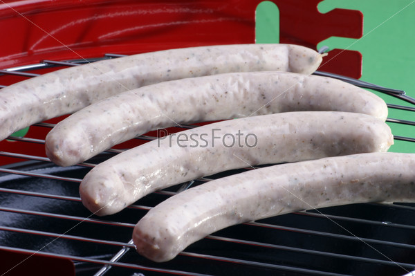 some home made sausage on a grill
