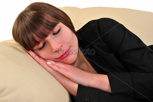 young woman is sleeping on a couch