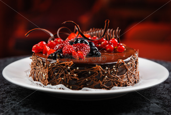 Luscious chocolate cake with fresh berries