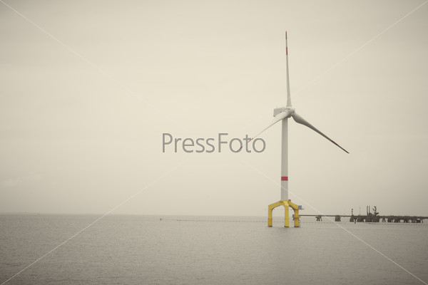 Offshore wind turbine for generating renewable and sustainable electric power from natural wind energy