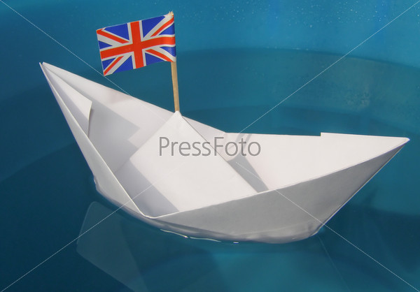 Paper ship with Union Jack UK Flag, stock photo