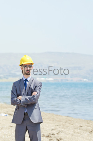 Oil engineer on sea side beach