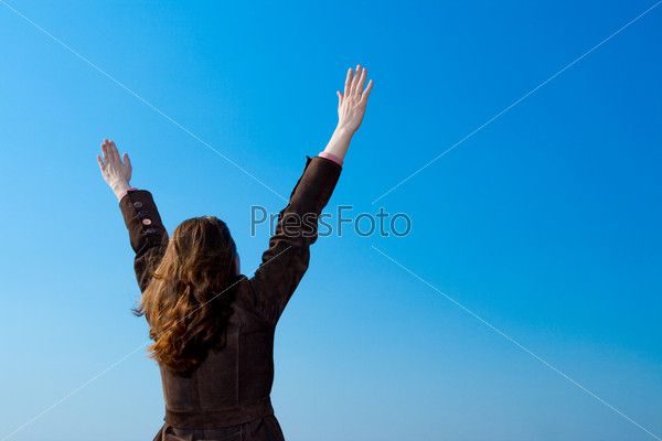 Woman rising hands
