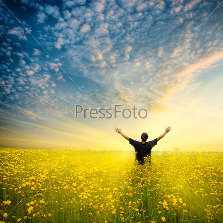 Man in yellow field, stock photo