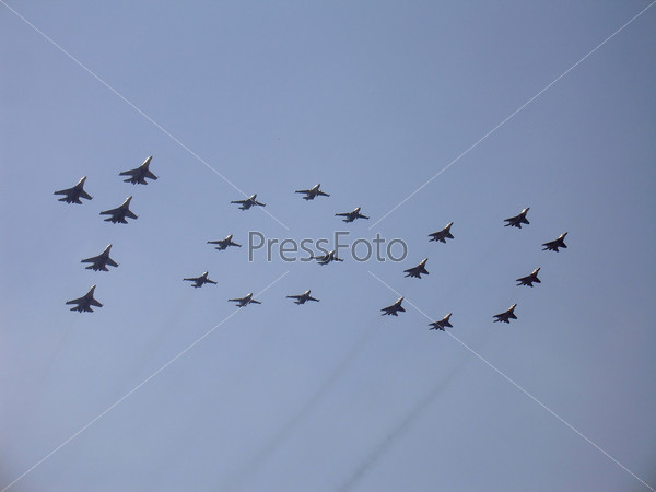 Figure 100 in sky with military fighters