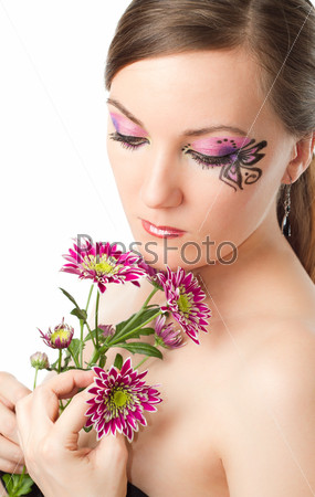 portrait of beautiful model woman with creative makeup and body art butterfly on face on white background