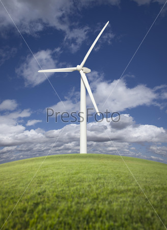 Single Wind Turbine Over Grass Field, Dramatic Sky and Clouds, stock photo