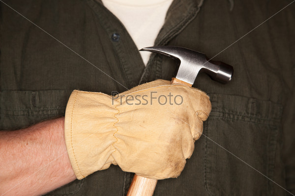 Man with Leather Construction Glove Holding Hammer