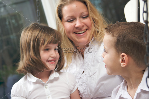 Mother and Children Talking and Laughing