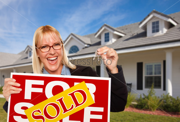 Female Holding Keys & Sold Real Estate Sign