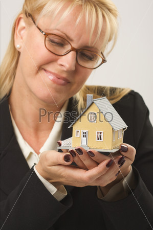 Woman Holding House