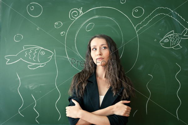 Girl over chalkboard with funny painted diver costume, stock photo