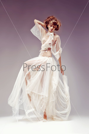 Beautiful elegant woman in white vintage dress - retro victorian style, renaissance. Heritage