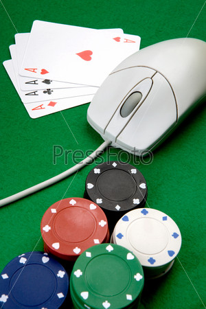 Online casino concept with mouse, cards and casino chips