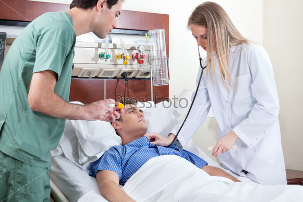 Doctor checking young patient