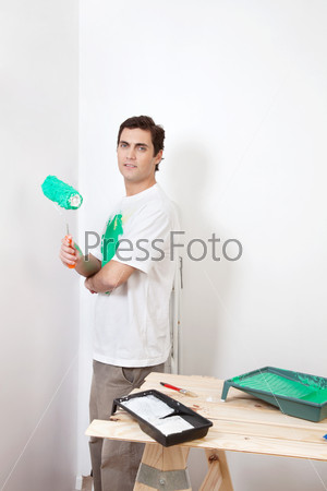 Man with paint roller