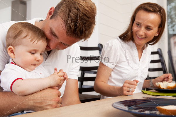 Happy Family Eating Meal