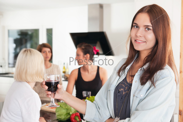 Young female friends having a casual party at home