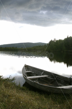 100 year old fishing boat on a northern lake nearroros røros, tolga;