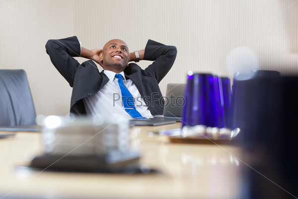 Relaxed businessman daydreaming