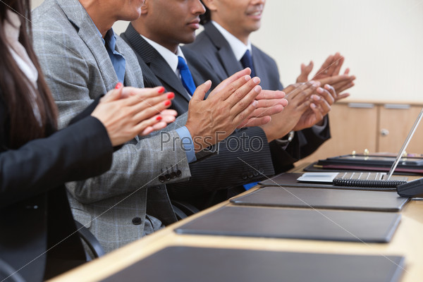 Business team applauding