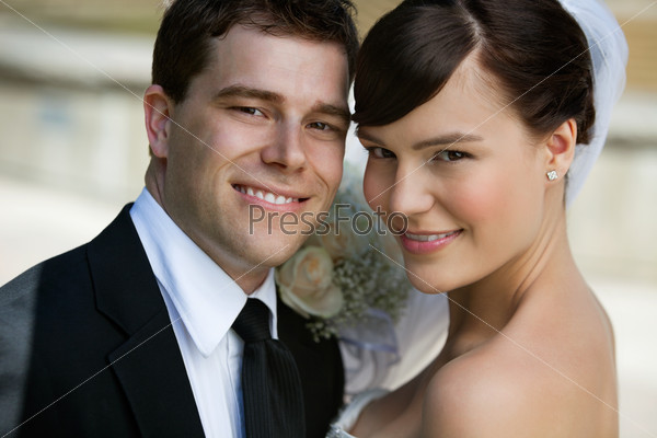 Portrait of lovely young married couple