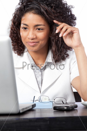 Female Doctor Using Laptop